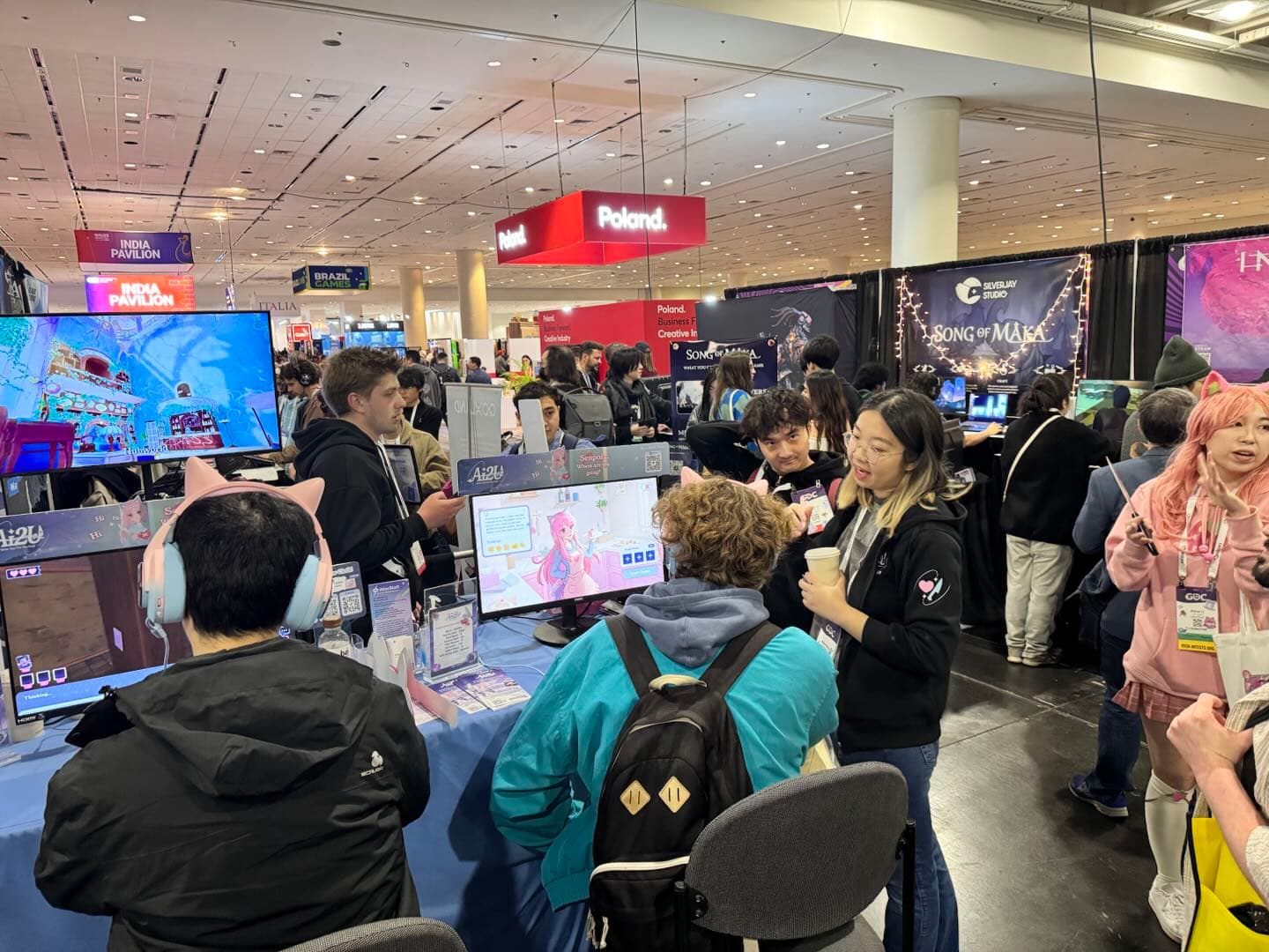 A visitor playtesting AI2U at GDC 2025